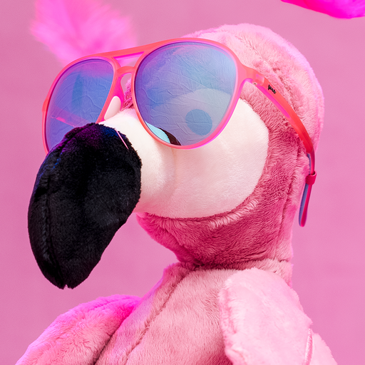 A fluffy stuffed flamingo wearing pink aviator sunglasses with mirrored reflective teal lenses.