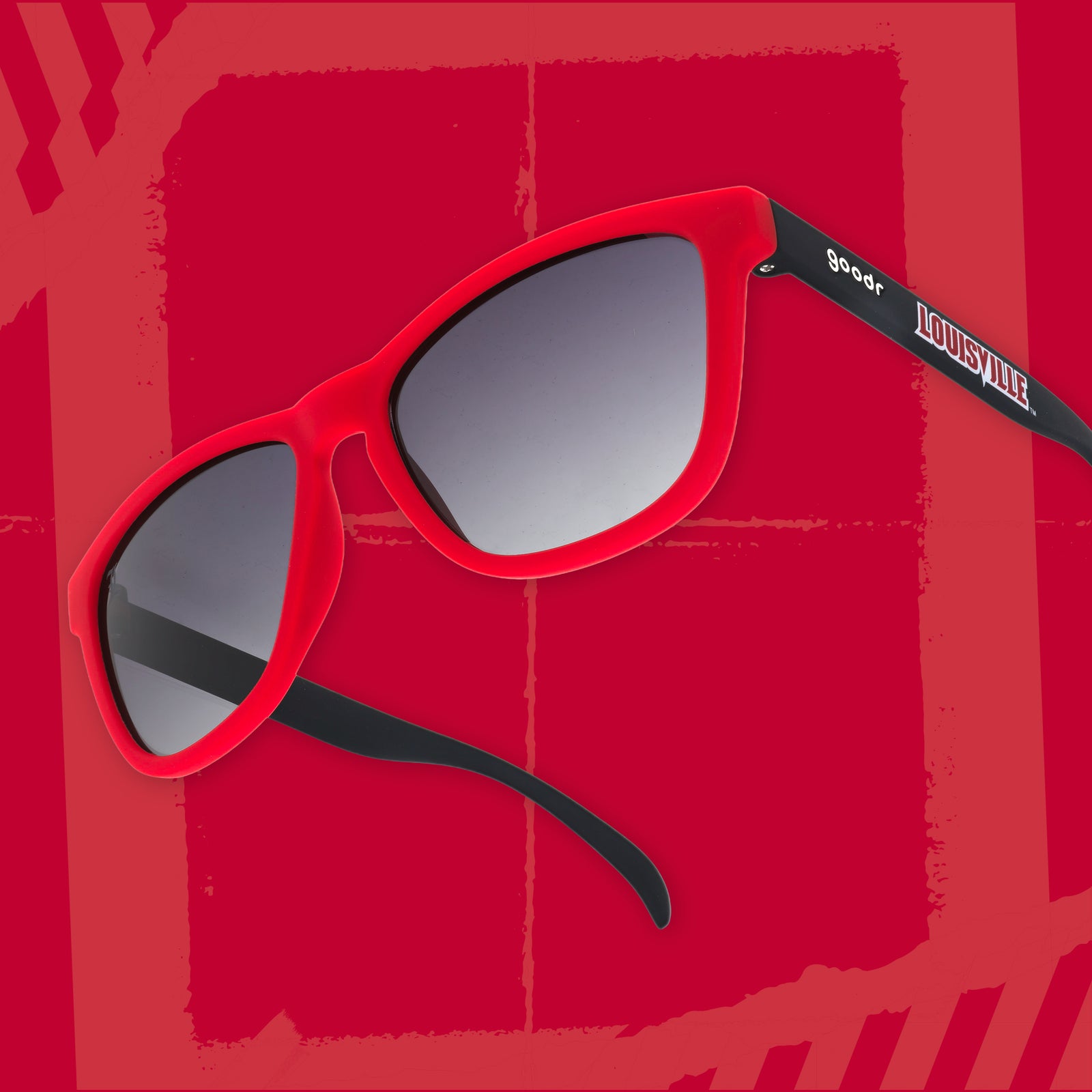 Right three-quarter angle view of black and Cardinal red sunglasses featuring black gradient lenses and a Louisville logo on a red background.