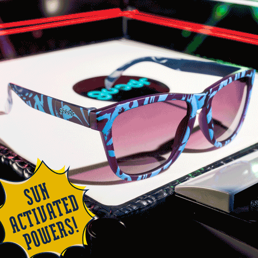 Three-quarter view of UV-reactive blue and purple shades with purple gradient lenses featuring a kraken-inspired design.