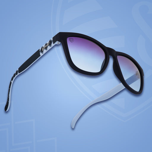 Three-quarter angle front view of Sporting KC shades on a blue background. Navy+blue frames. Dark blue lenses.