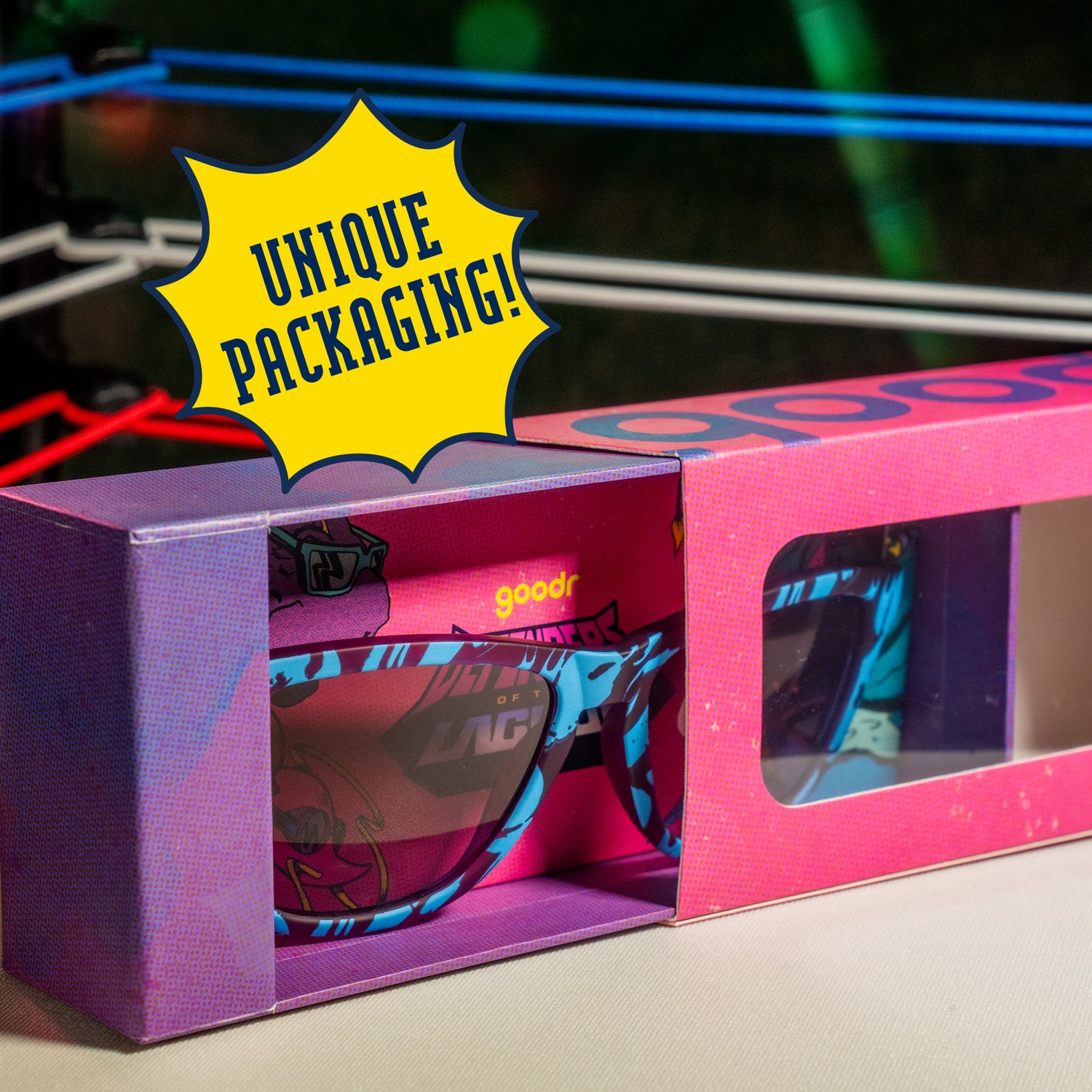 Sunglasses in a pink and purple box with 'unique packaging' text overlay.