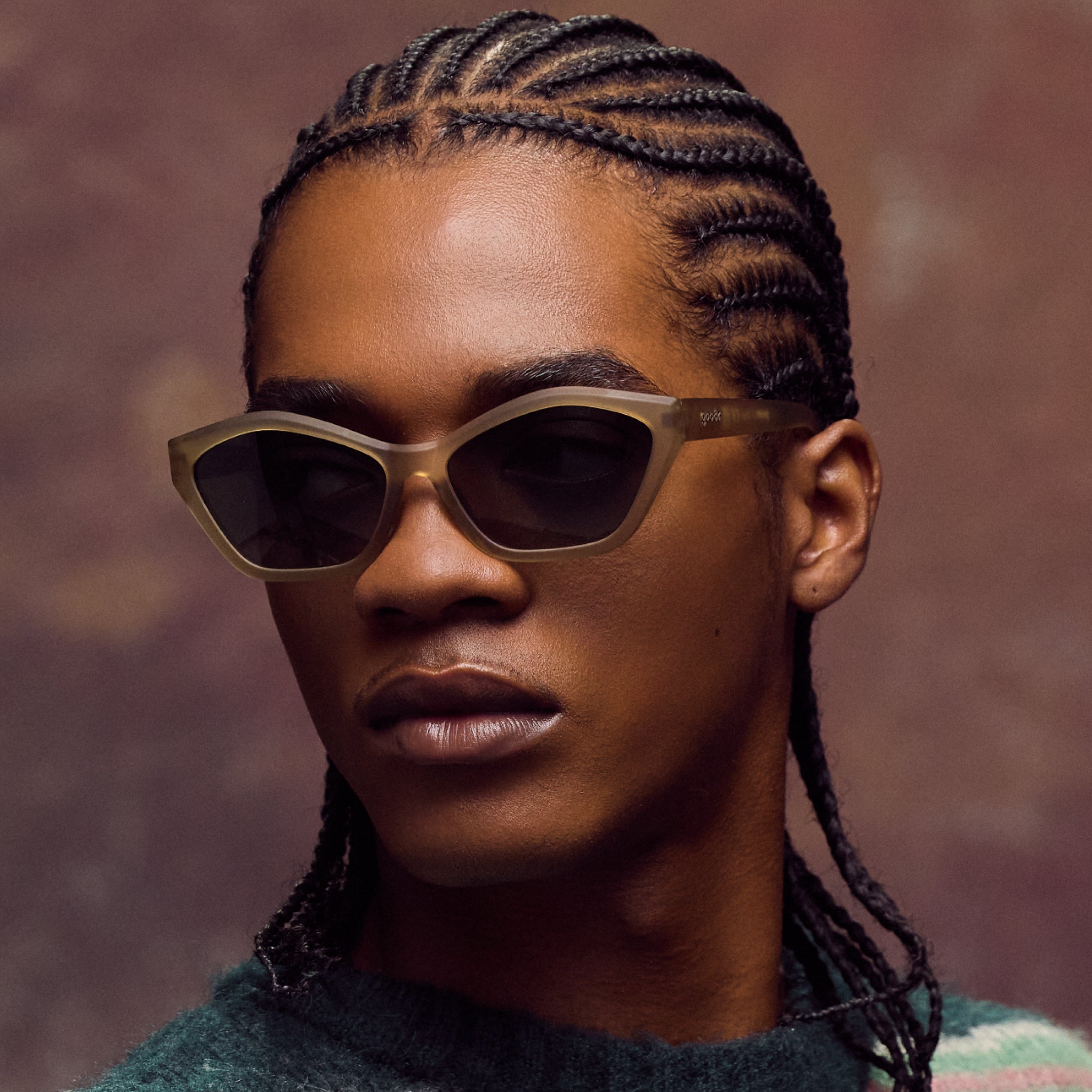 Person wearing sunglasses with a blurred background