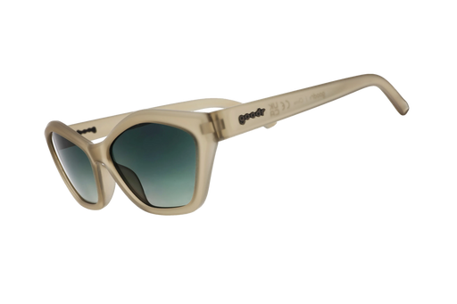Beige sunglasses with dark lenses on a white background