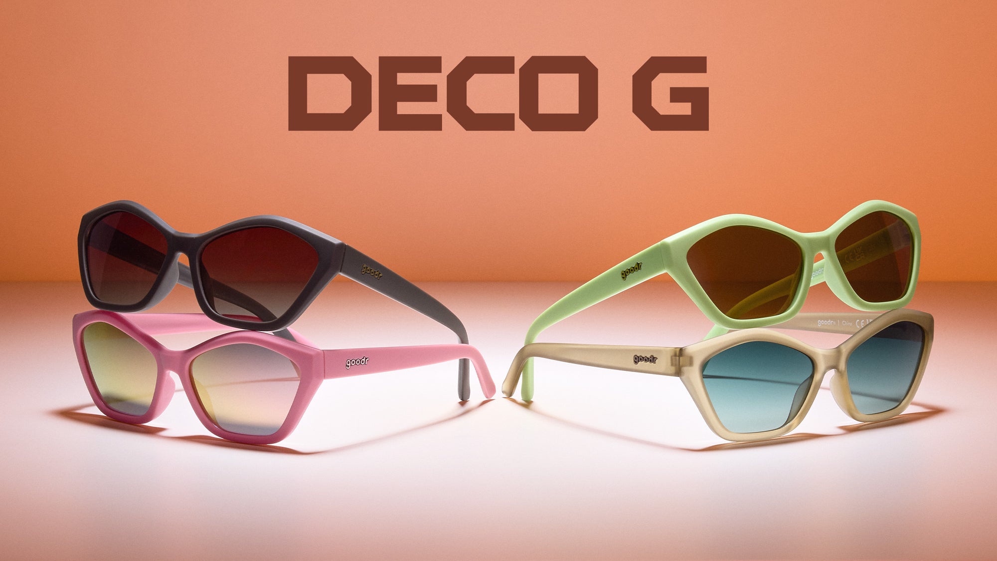Three pairs of sunglasses with 'DECO G' branding on an orange background
