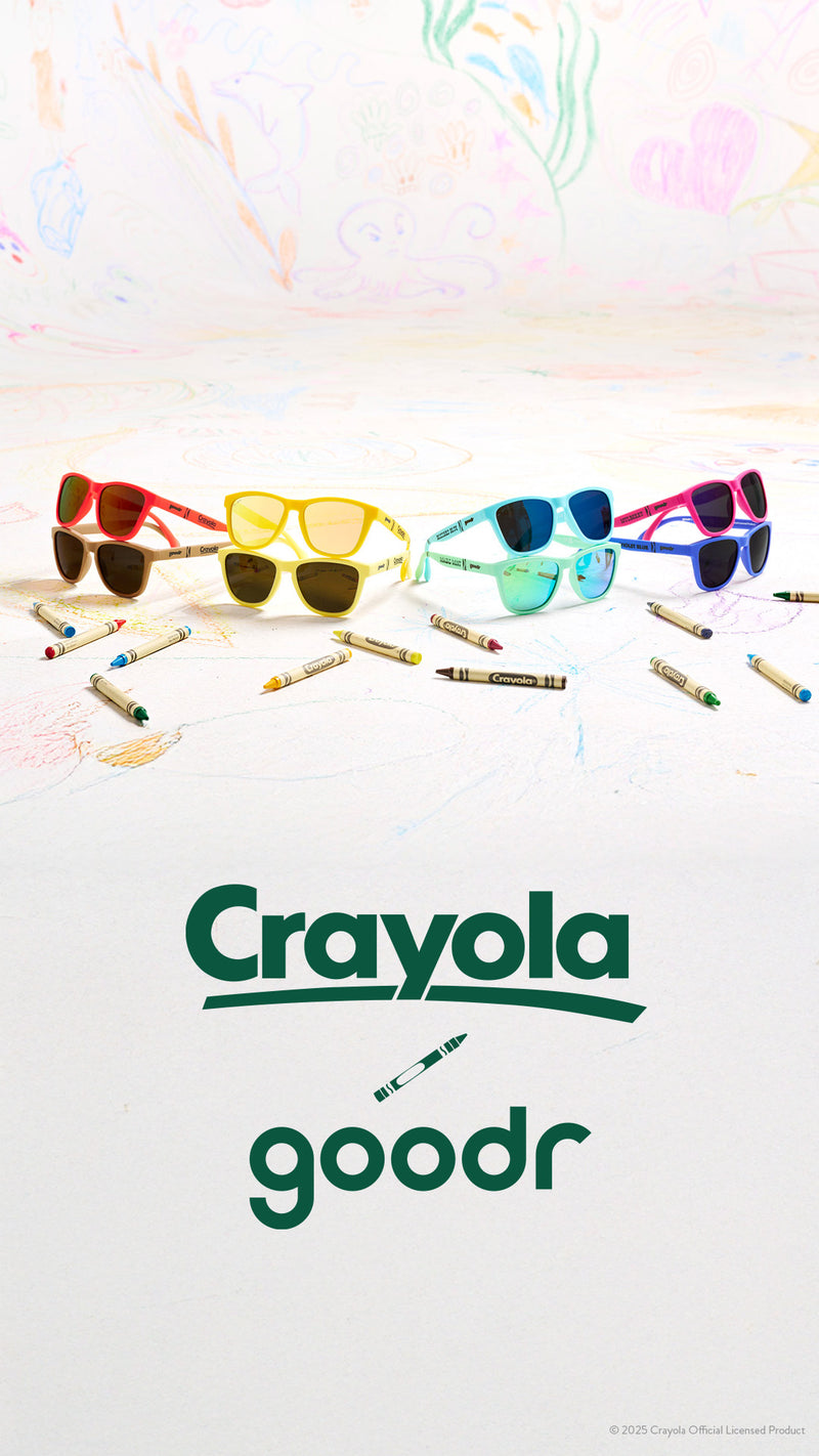 Crayola x goodr sunglasses with crayons on a colorful background