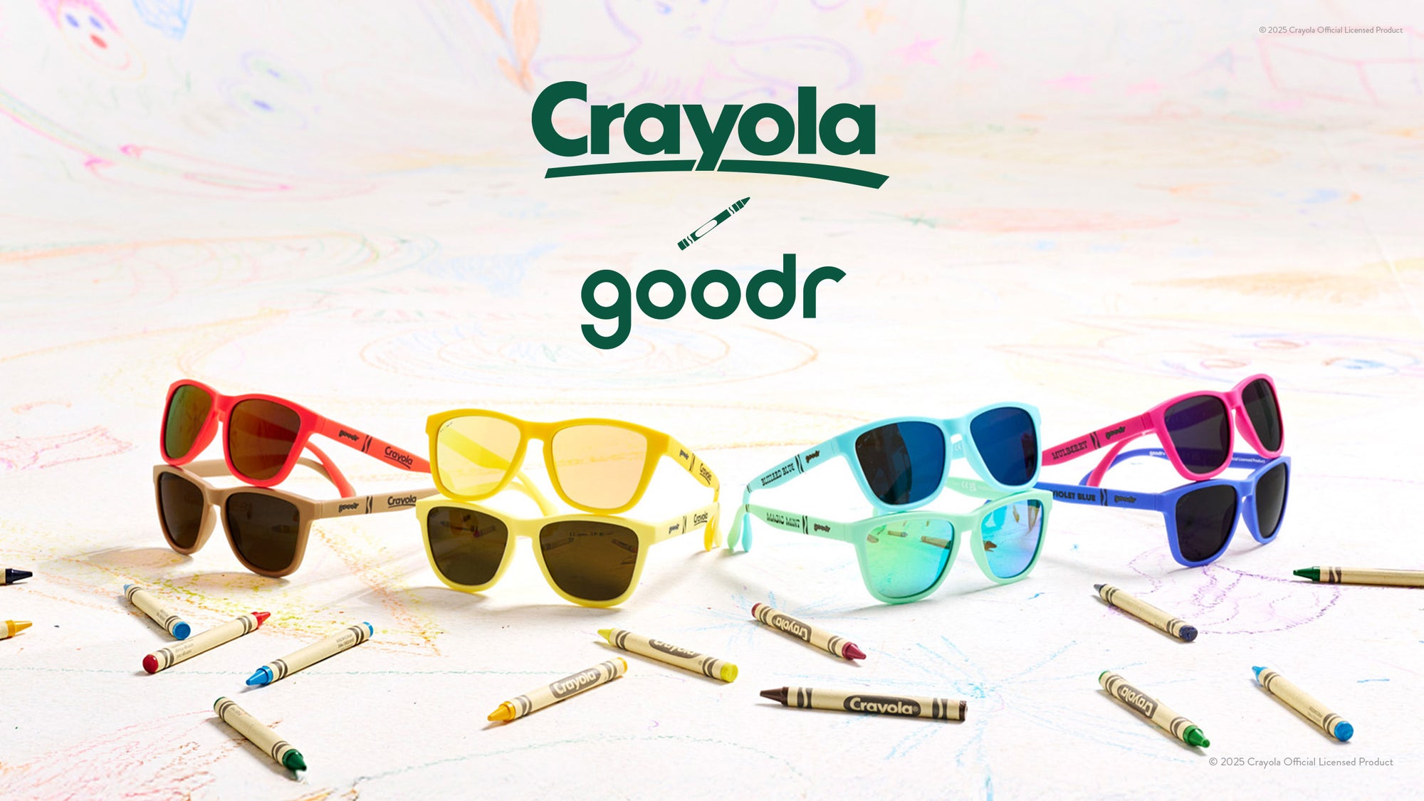 Crayola x goodr sunglasses with crayons on a colorful background