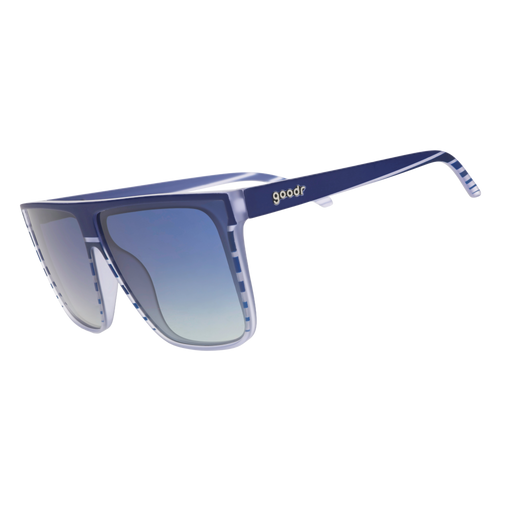 Three-quarter-angle view of translucent blue-purple flat-top Fly Gs with a retrowave-striped design and blue gradient lenses.