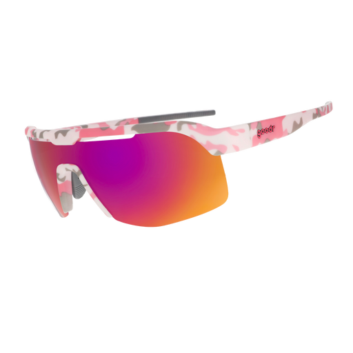 Sport sunglasses with a pink and white camouflage patterned frame and a large shield lens featuring a vibrant red-to-orange mirrored gradient, shown on a plain white background.