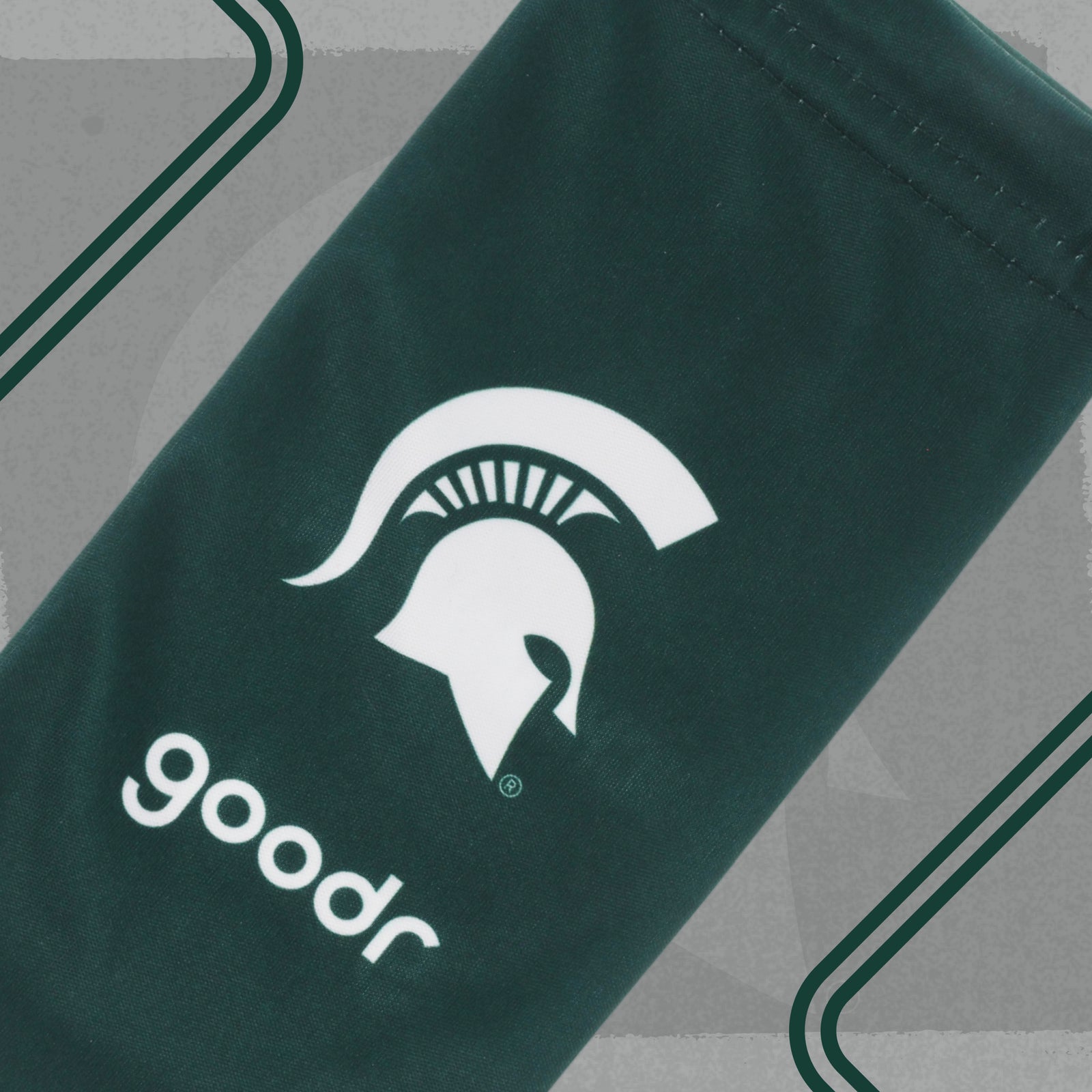 Dark green microfiber sunglasses pouch with white Michigan State and goodr logos.