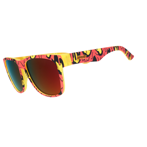 Red, yellow, and black goopy-patterned sunglasses with red mirrored lenses, shown at an angle on a white background.