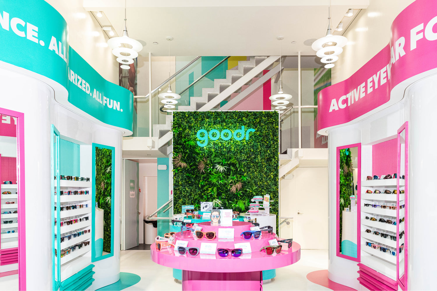 Store interior with 'goodr' branding and product displays.