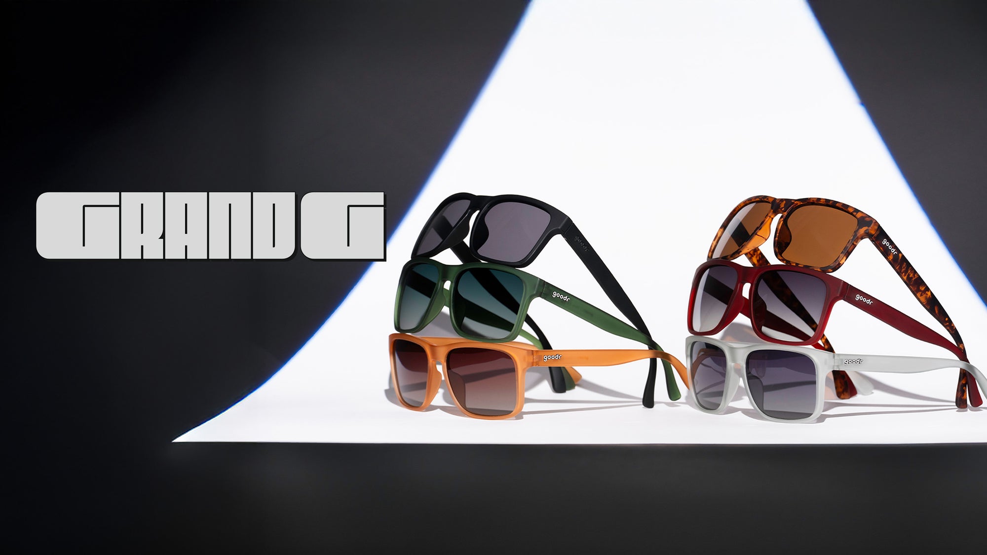 Collection of sunglasses with a brand logo on a dark background